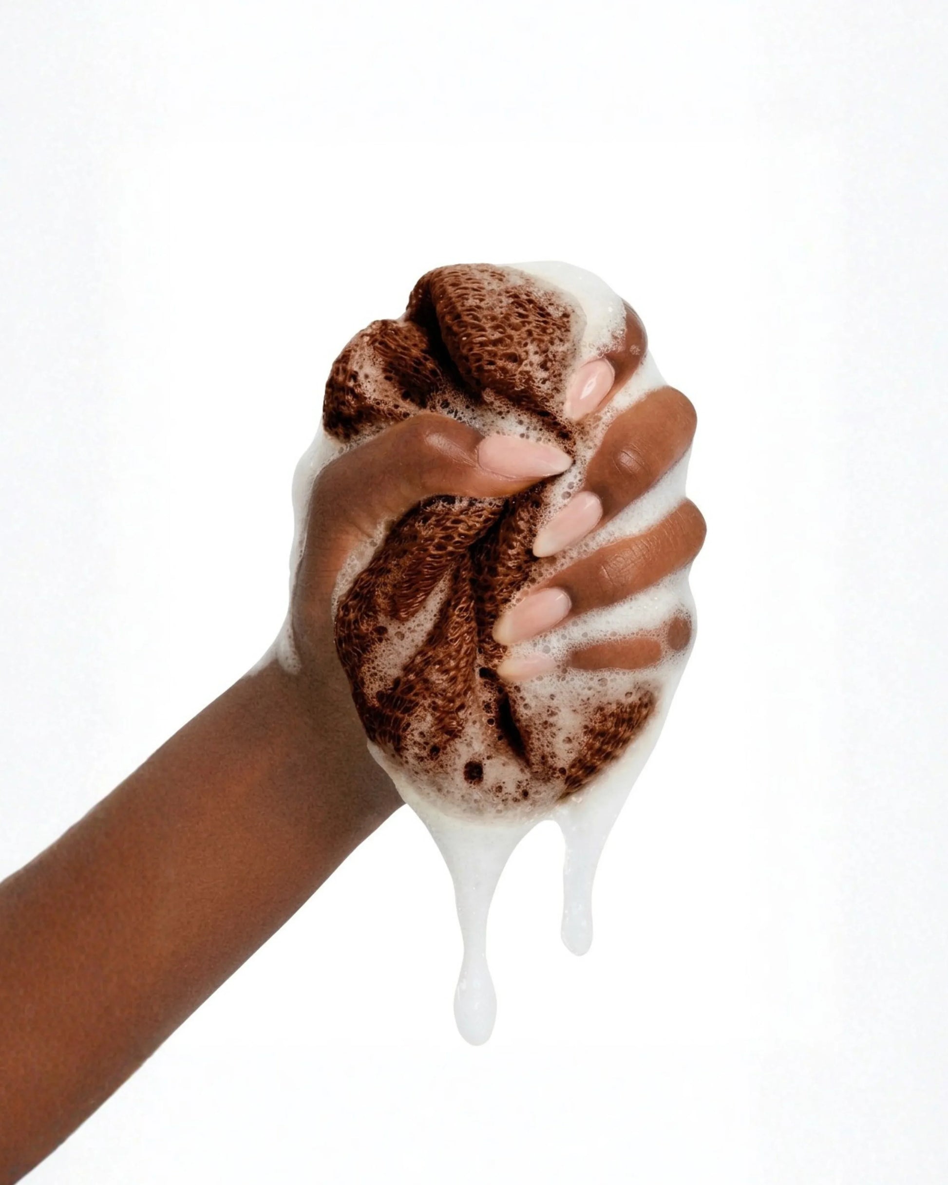African net sponge from Seele & Bloom, natural exfoliating scrubber with a textured net surface for gentle skin cleansing.