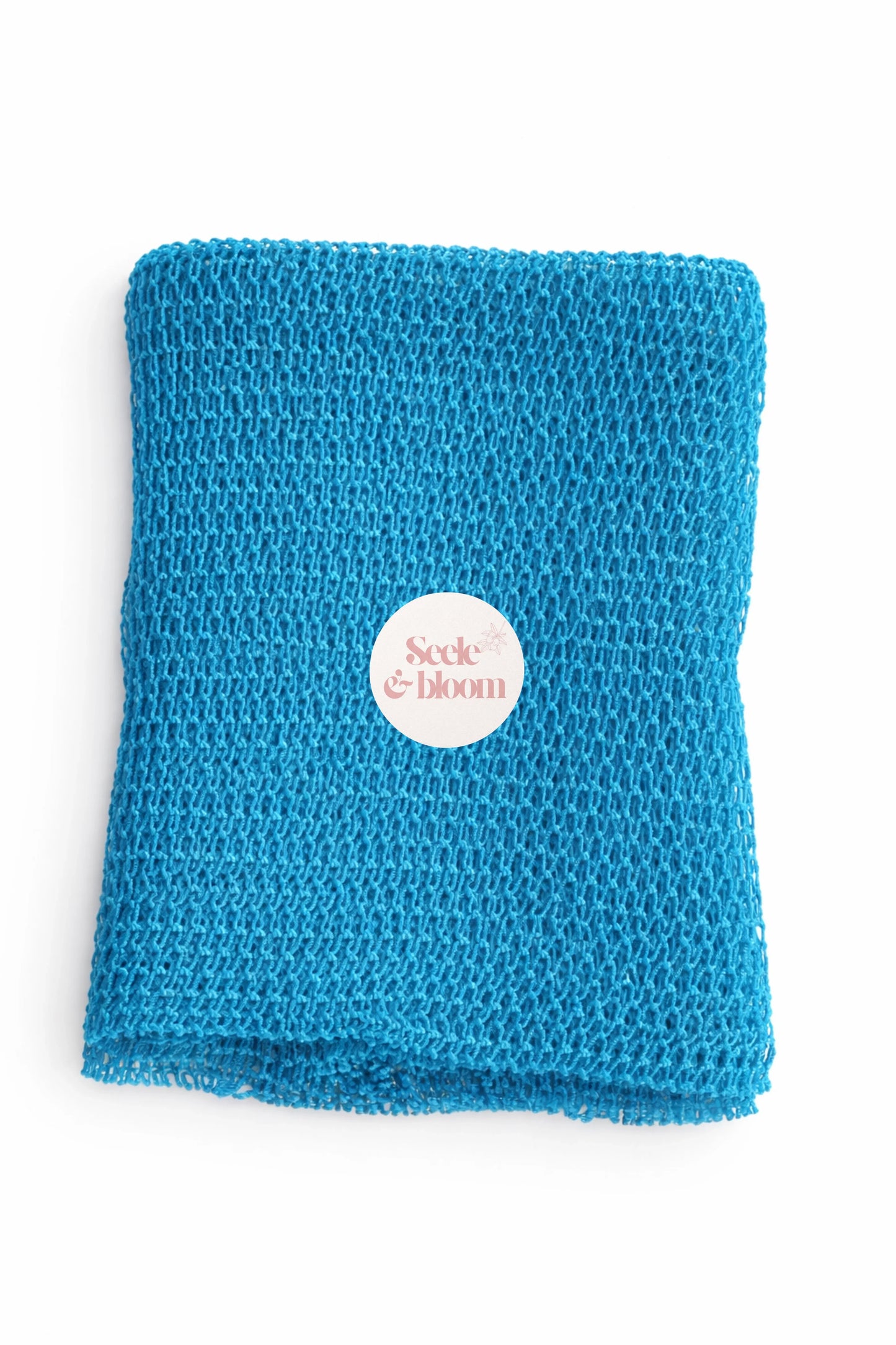 African net sponge by Seele & Bloom, showing a close-up of the textured, lightweight net material used for exfoliating and cleansing.